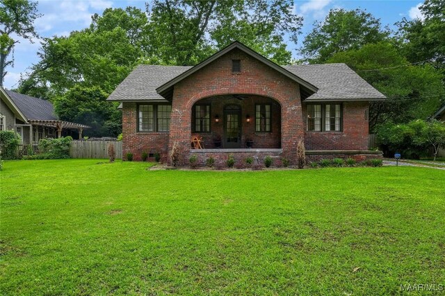3328 Lebron Rd, Montgomery, AL 36106 - tudor house with brick siding and a shingled roof