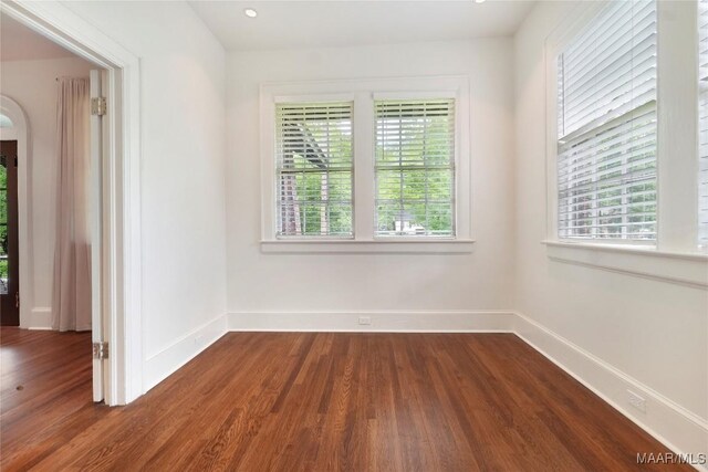 3328 Lebron Rd, Montgomery, AL 36106 - spare room featuring dark wood-type flooring and baseboards