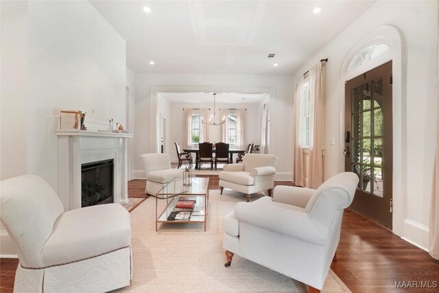 3328 Lebron Rd, Montgomery, AL 36106 - living room featuring wood finished floors, recessed lighting, baseboards, and a glass covered fireplace