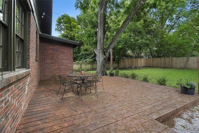 3328 Lebron Rd, Montgomery, AL 36106 - view of patio with outdoor dining area and a deck