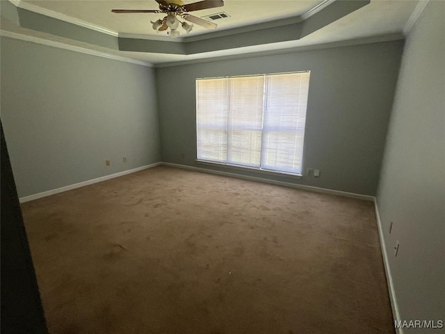 1853 Sanford Dr, Prattville, AL 36066 - carpeted empty room with a tray ceiling, crown molding, a ceiling fan, and baseboards