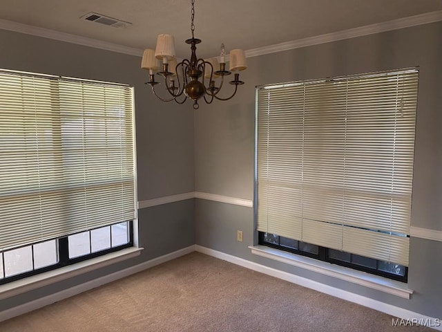1853 Sanford Dr, Prattville, AL 36066 - carpeted spare room with a chandelier, ornamental molding, and baseboards