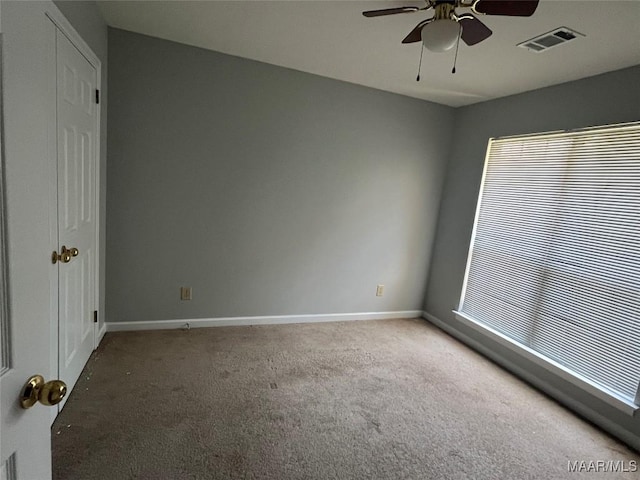 1853 Sanford Dr, Prattville, AL 36066 - unfurnished bedroom featuring carpet floors, baseboards, multiple windows, and ceiling fan