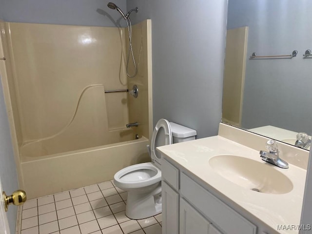 1853 Sanford Dr, Prattville, AL 36066 - bathroom with tile patterned floors, washtub / shower combination, vanity, and toilet