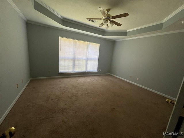 1853 Sanford Dr, Prattville, AL 36066 - spare room featuring a raised ceiling, ornamental molding, carpet flooring, a ceiling fan, and baseboards