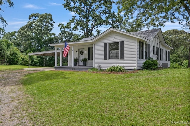 1582 W Old Hayneville Rd, Le Grand, AL 36105 - view of front of property featuring a front yard, covered porch, driveway, and cooling unit