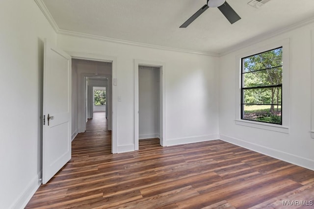 1582 W Old Hayneville Rd, Le Grand, AL 36105 - spare room featuring ornamental molding, ceiling fan, dark wood-style flooring, and baseboards