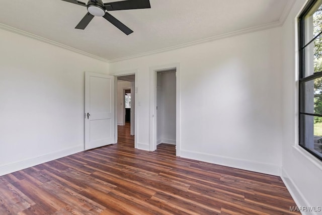 1582 W Old Hayneville Rd, Le Grand, AL 36105 - empty room featuring dark wood-type flooring, ornamental molding, baseboards, and a ceiling fan