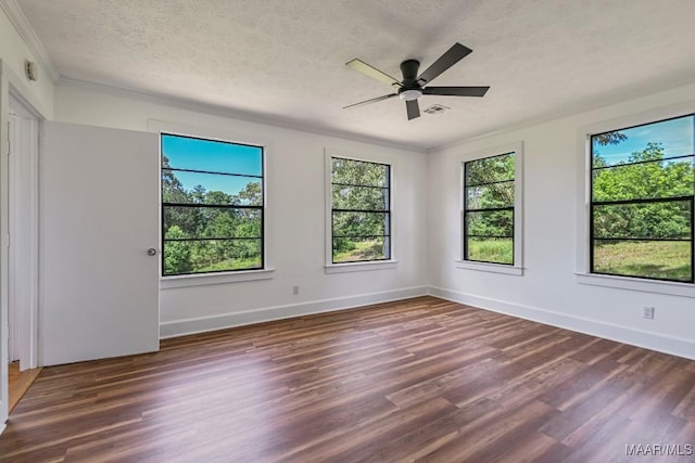 1582 W Old Hayneville Rd, Le Grand, AL 36105 - empty room with wood finished floors, ornamental molding, a textured ceiling, a ceiling fan, and baseboards