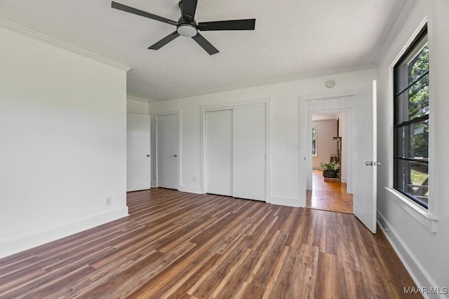 1582 W Old Hayneville Rd, Le Grand, AL 36105 - unfurnished bedroom featuring wood finished floors, crown molding, baseboards, and ceiling fan