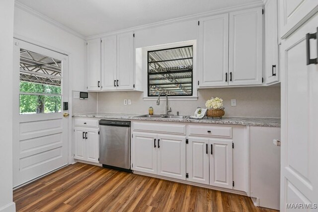 1582 W Old Hayneville Rd, Le Grand, AL 36105 - kitchen with dishwasher, a sink, white cabinets, wood finished floors, and light stone counters