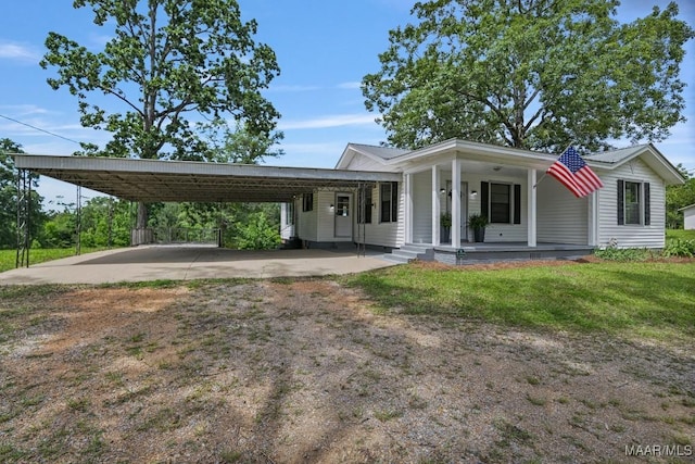 1582 W Old Hayneville Rd, Le Grand, AL 36105 - view of front of property featuring dirt driveway, covered porch, a front lawn, and an attached carport