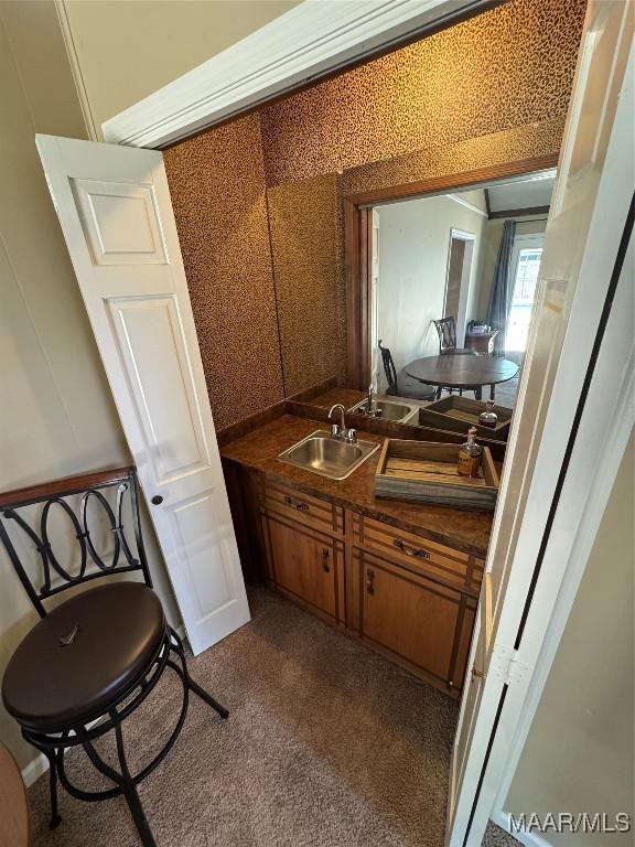 215 W Castlewood Dr, Selma, AL 36701 - bathroom featuring a sink and a decorative wall