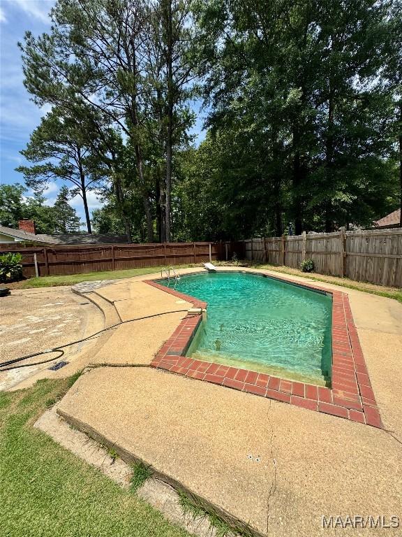 215 W Castlewood Dr, Selma, AL 36701 - view of pool with a fenced backyard and a patio