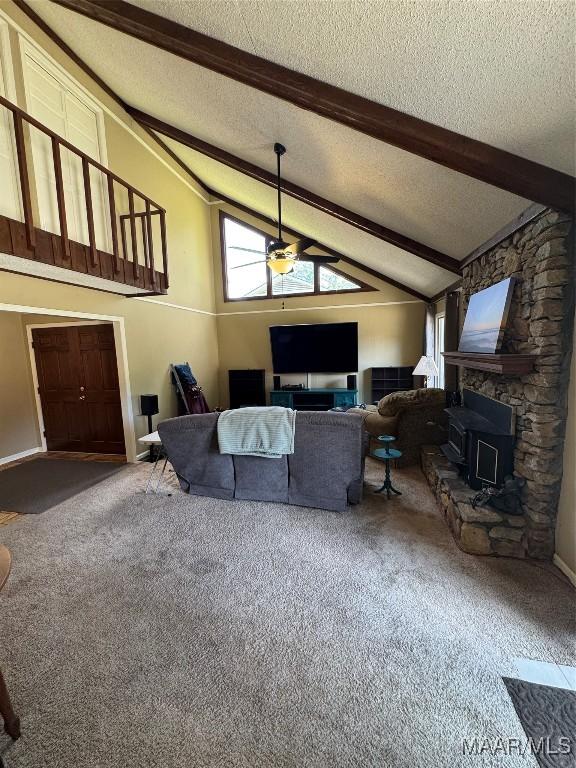 215 W Castlewood Dr, Selma, AL 36701 - living area with carpet floors, a textured ceiling, healthy amount of natural light, and ceiling fan
