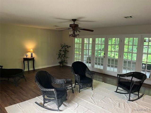11 Wilkins Rd, Selma, AL 36701 - sitting room featuring ceiling fan, wood finished floors, plenty of natural light, and baseboards