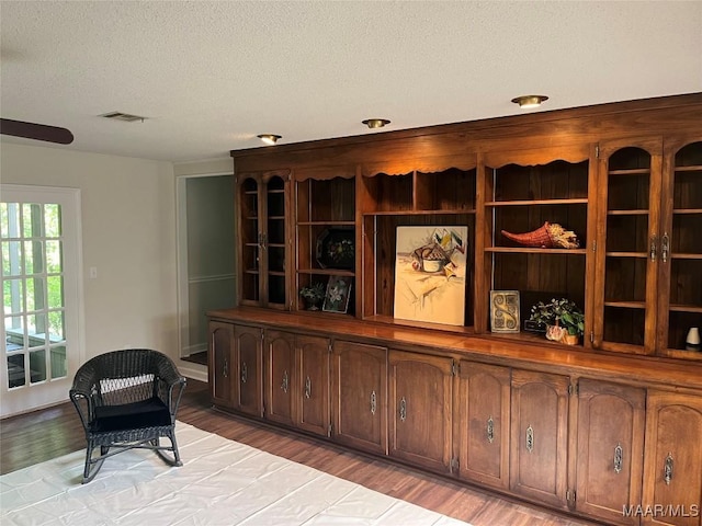 11 Wilkins Rd, Selma, AL 36701 - interior space with a textured ceiling and light wood-type flooring