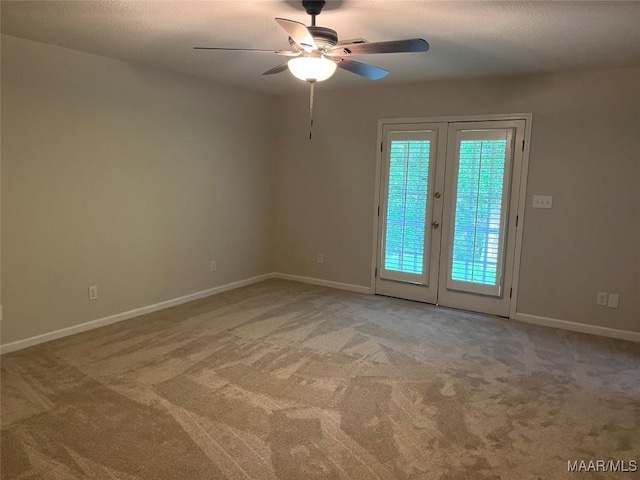 11 Wilkins Rd, Selma, AL 36701 - spare room with a ceiling fan, light colored carpet, and baseboards