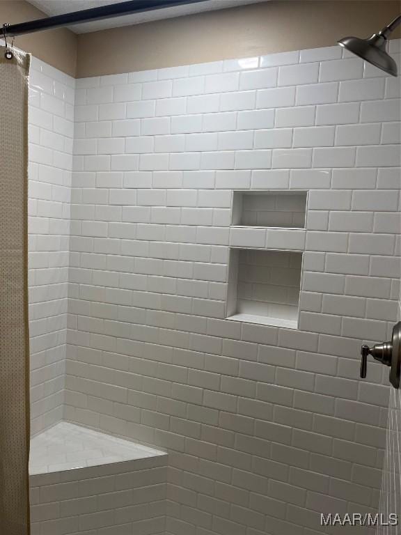 11 Wilkins Rd, Selma, AL 36701 - bathroom featuring a tile shower