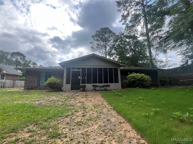 11 Wilkins Rd, Selma, AL 36701 - back of property with a sunroom