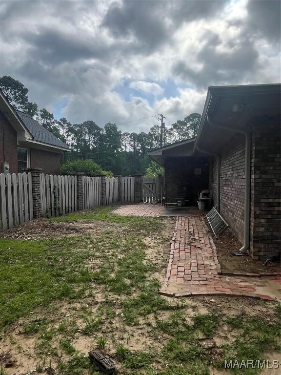 11 Wilkins Rd, Selma, AL 36701 - view of yard featuring a patio area