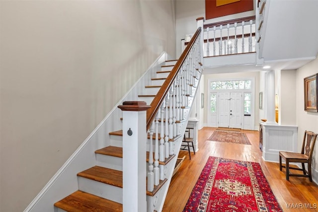 1533 Gilmer Ave, Montgomery, AL 36104 - entryway with hardwood / wood-style floors, stairs, and a high ceiling