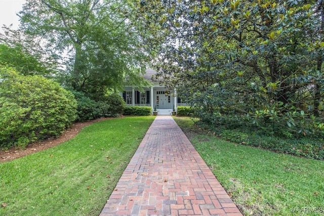 1533 Gilmer Ave, Montgomery, AL 36104 - obstructed view of property featuring a front yard