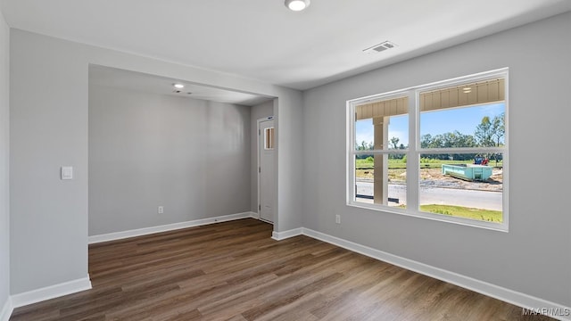 6008 Cunningham Trl, Montgomery, AL 36116 - unfurnished room featuring baseboards and dark wood-style floors