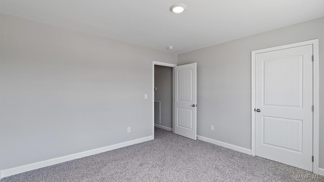 6008 Cunningham Trl, Montgomery, AL 36116 - unfurnished bedroom featuring carpet and baseboards