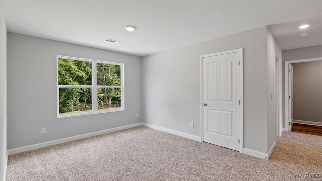 6008 Cunningham Trl, Montgomery, AL 36116 - unfurnished bedroom featuring carpet, baseboards, and recessed lighting