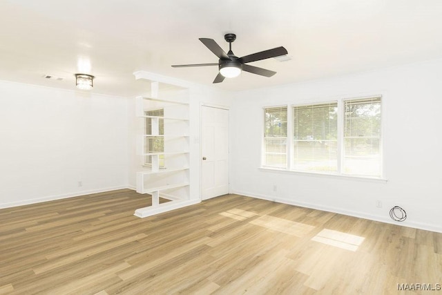 3119 Gaston Ave, Montgomery, AL 36105 - unfurnished room with light wood-style flooring, ceiling fan, and baseboards