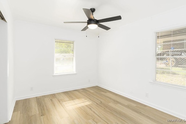3119 Gaston Ave, Montgomery, AL 36105 - spare room with light wood finished floors, a ceiling fan, and baseboards