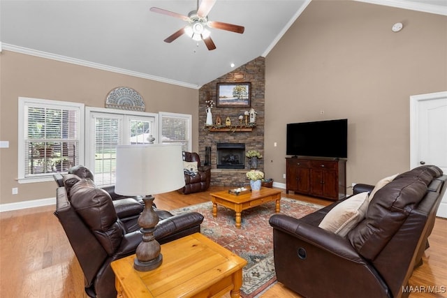 512 Golson Rd, Prattville, AL 36067 - living room with a ceiling fan, crown molding, light wood-style floors, a fireplace, and baseboards
