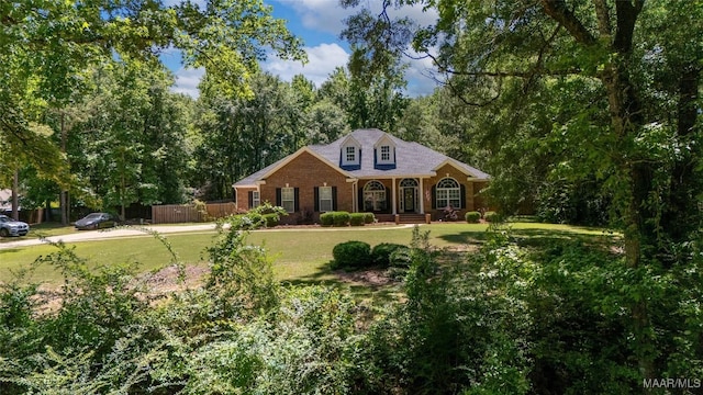 512 Golson Rd, Prattville, AL 36067 - traditional-style home with a porch and brick siding