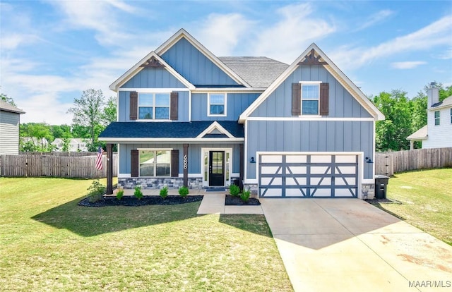 688 Tiger Trl, Opelika, AL 36804 - craftsman-style home featuring board and batten siding, roof with shingles, driveway, an attached garage, and covered porch