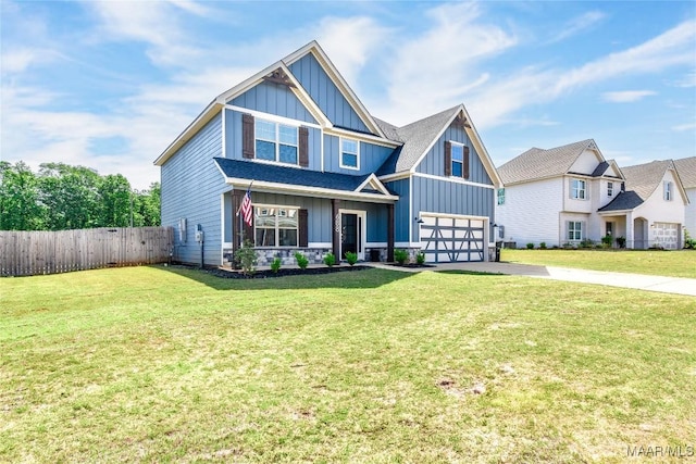 688 Tiger Trl, Opelika, AL 36804 - craftsman inspired home with board and batten siding, asphalt driveway, and an attached garage