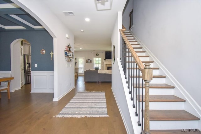 688 Tiger Trl, Opelika, AL 36804 - staircase featuring wood finished floors, arched walkways, and recessed lighting