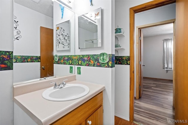 6390 County Road 37, Valley Grande, AL 36701 - bathroom featuring vanity and wood finished floors
