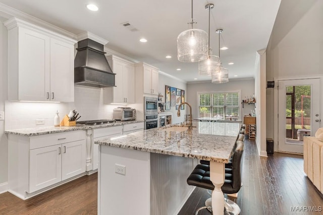 1478 Trolley Rd, Prattville, AL 36066 - kitchen featuring custom exhaust hood, a sink, gas stovetop, white cabinetry, and dark wood-type flooring