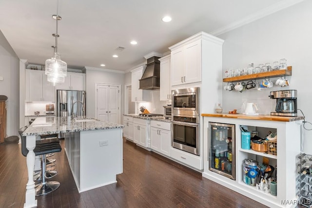 1478 Trolley Rd, Prattville, AL 36066 - kitchen with stainless steel appliances, premium range hood, a sink, beverage cooler, and ornamental molding