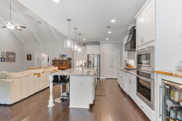 1478 Trolley Rd, Prattville, AL 36066 - kitchen with wine cooler, appliances with stainless steel finishes, open floor plan, custom range hood, and a ceiling fan
