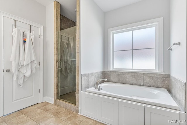 1478 Trolley Rd, Prattville, AL 36066 - bathroom with a bath, a shower stall, and tile patterned floors