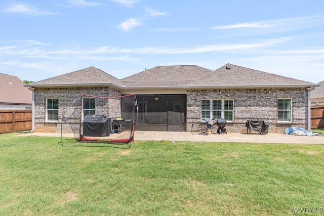 1478 Trolley Rd, Prattville, AL 36066 - rear view of property featuring brick siding, a patio area, and roof with shingles