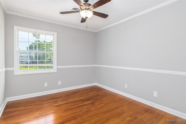 3212 Mcgehee Rd, Montgomery, AL 36111 - spare room featuring baseboards, wood finished floors, a ceiling fan, and crown molding