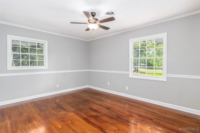 3212 Mcgehee Rd, Montgomery, AL 36111 - spare room featuring baseboards, wood finished floors, ceiling fan, and ornamental molding