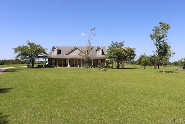 663 Hobbie Rd, Montgomery, AL 36105 - rear view of house with a lawn and covered porch