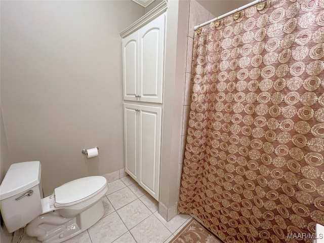 7178 Wyngrove Dr, Montgomery, AL 36117 - bathroom with toilet, tile patterned flooring, and a shower with curtain
