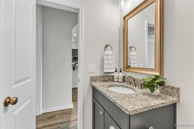 400 Lismore Pl, Montgomery, AL 36117 - bathroom featuring vanity, wood finished floors, and baseboards
