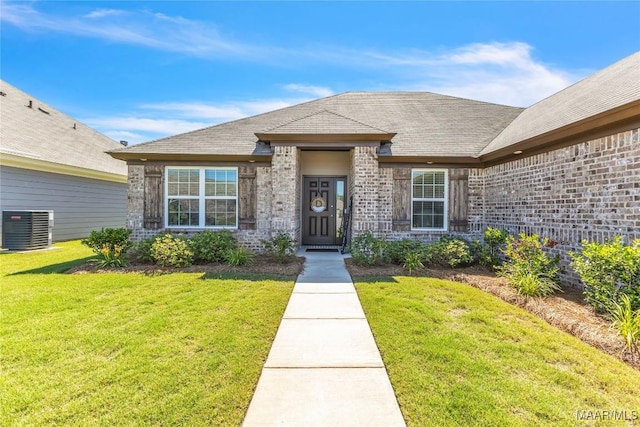 400 Lismore Pl, Montgomery, AL 36117 - entrance to property featuring central AC, brick siding, and a yard