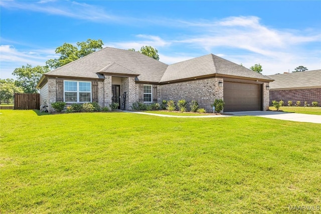 400 Lismore Pl, Montgomery, AL 36117 - view of front facade featuring an attached garage, brick siding, and concrete driveway